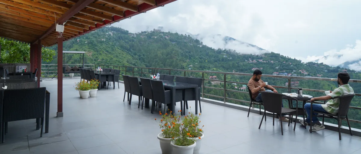 Open rooftop terrace, tables set, Hotel Cloud Inn, Ramgarh, Nainital