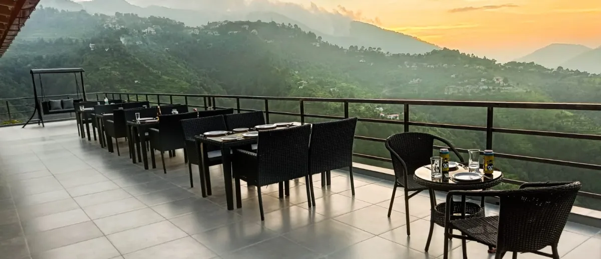 Open rooftop terrace, tables set, Hotel Cloud Inn, Ramgarh, Nainital